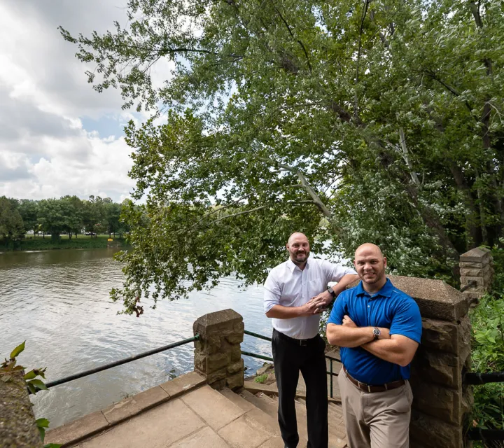 Andy Kuhn ’05 (left) and Bret Allphin ’01 focus on community collaboration to help strengthen Southeast Ohio’s economy and improve the lives of its residents.