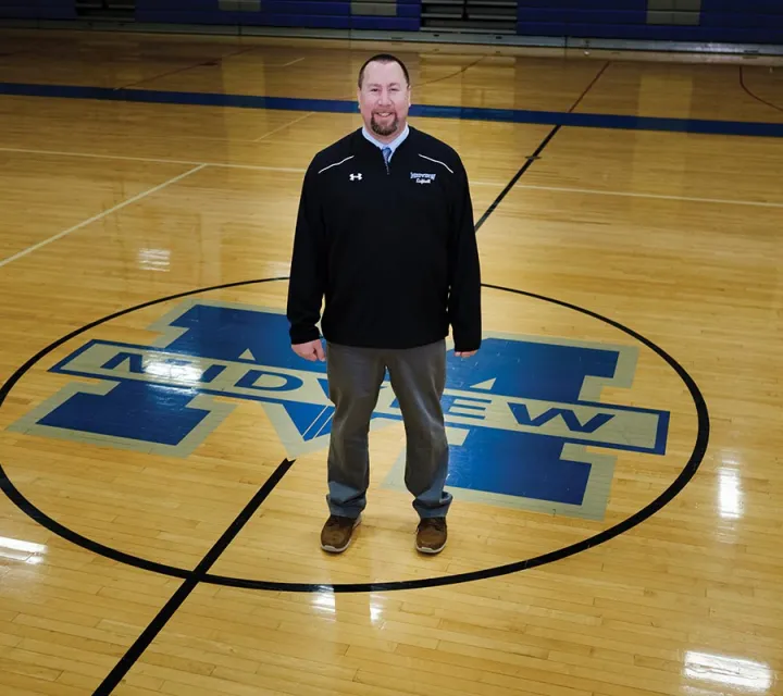 Dan May '3 stands on center court of the Midview basketball court
