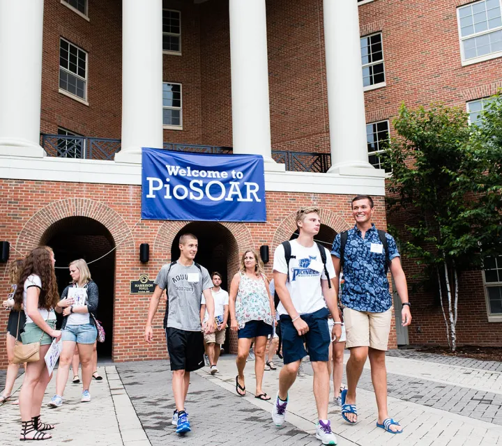 New Students walking out of a PioSOAR session in Harrison Hall