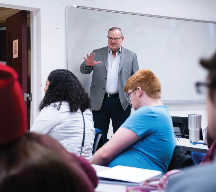 Don Ritter, a Marietta College alumni, speaks to a group of music students