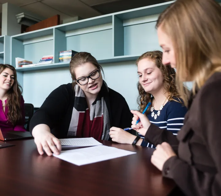 Marietta College students meet with Alane Sanders in the new Communication Resource Center