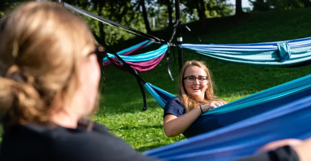 Girls enjoying a sunny day in hammocks