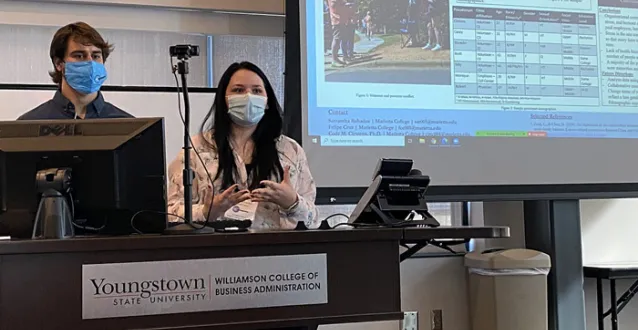 Felipe Cruz and Samantha Rubadue presenting