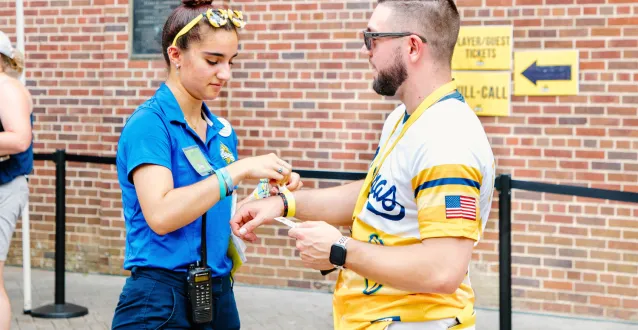 Intern helping a customer