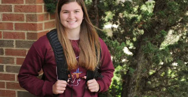 Allison Loase in front of a tree