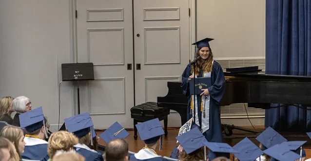 Alison Loase speaking at graduation