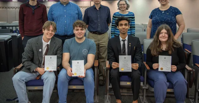 Student inductees with the Physics faculty