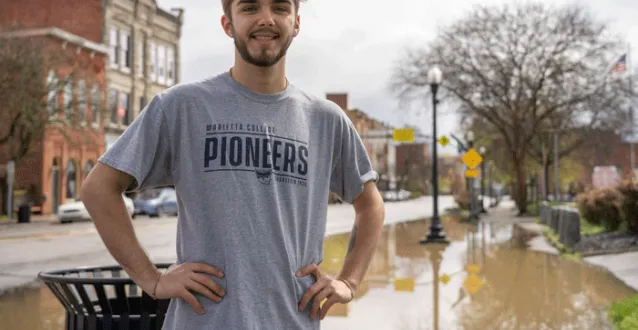 Colin Campagne standing in downtown Marietta