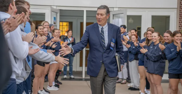 Students recognize Joe Chlapaty for his generosity.