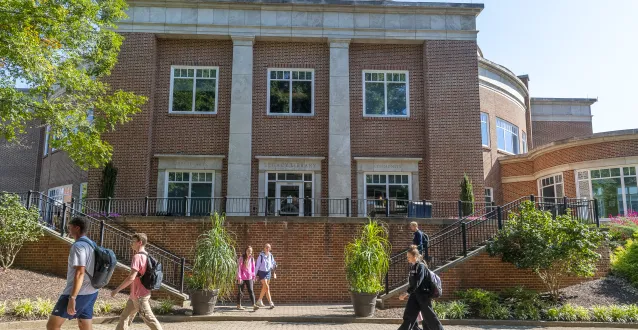 Marietta College students walk on campus near the Legacy Library