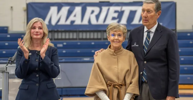 Joe and Linda Chlapaty  with President Kathleen Dougherty