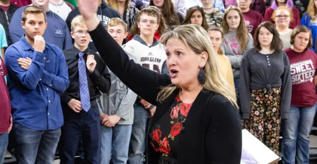 Amy Yekel working with high school students