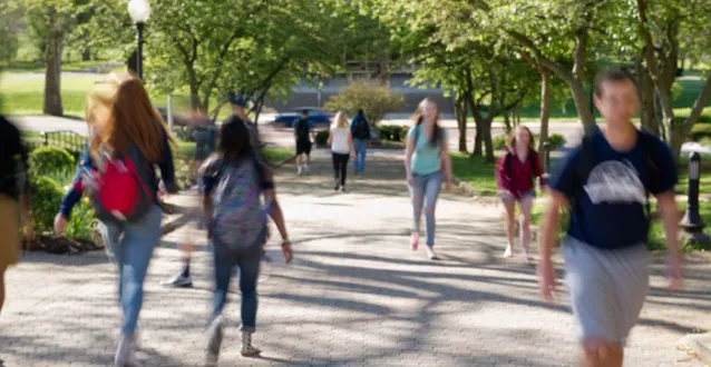 Students walking along The Christy Mall