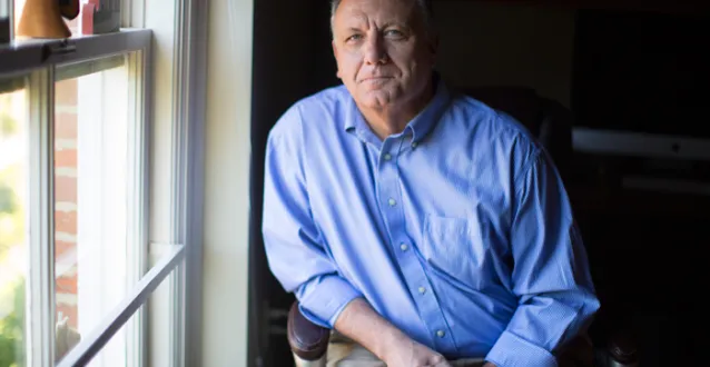 Bill Bauer sitting in his office