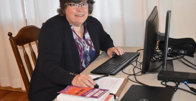 Professor Bev Hogue teaching class remotely from her home