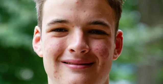 Headshot of Rickey Scholar Alex Blackston