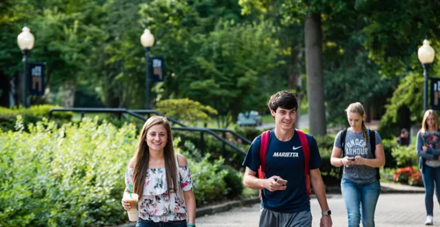 Students walking along The Christy Mall