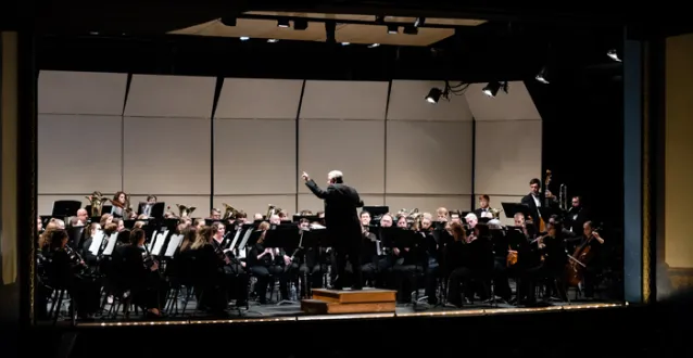 Marietta College band and wind ensemble performing at Peoples Bank Theatre