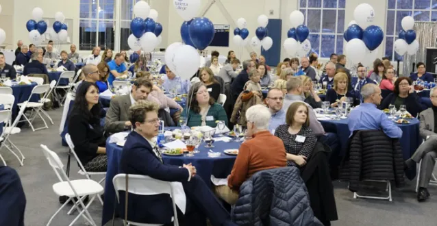 Marietta College employees sitting at tables during Founders Day 2020