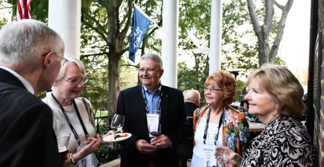 Members of the Class of 1967 gather at homecoming