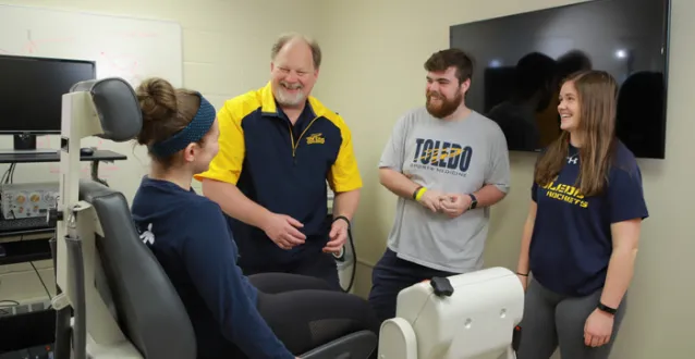 Dr. Chris Ingersoll ’85 with students at the University of Toledo