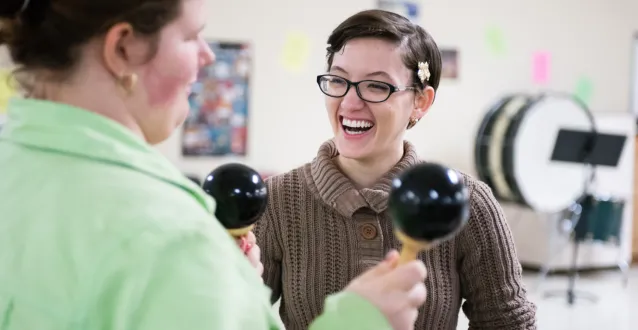 Marietta student helping someone with moringas