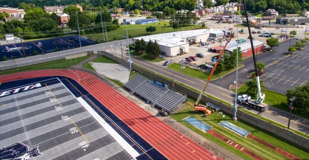 Photo of Don Drumm Stadium lighting being installed