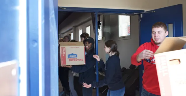 Students loading boxes on MLK Day of Service