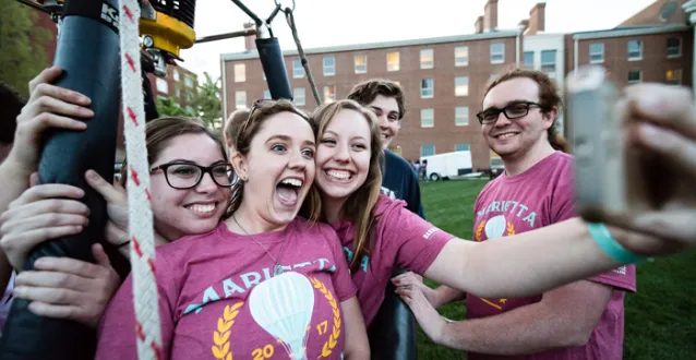 Students taking a selfie on the hot air balloon