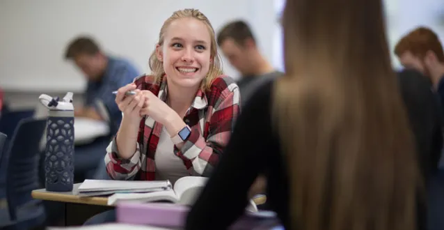 Female student smiling in class