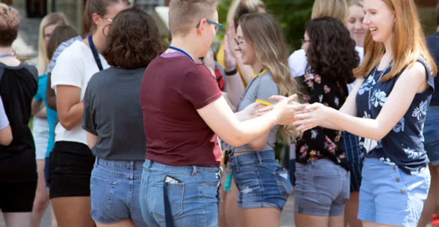 Female students participating in an icebreaker at the first WISE