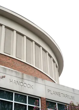 The outer facade of the Anderson Hancock Planetarium
