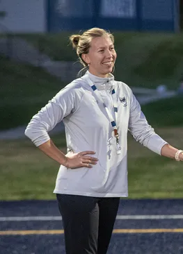 Marietta College women's lacrosse head coach Mallory Nadrah looks on during practice