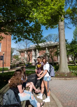Students chat outside of Erwin Hall at Marietta College