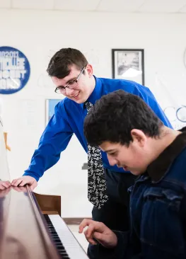 A Marietta College Music Education major teaching piano