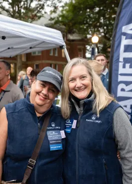 Marietta College alumni pose for a photo during homecoming