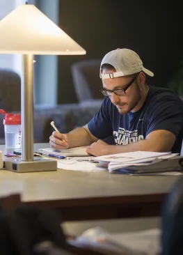 A Marietta College student studies in Legacy Library