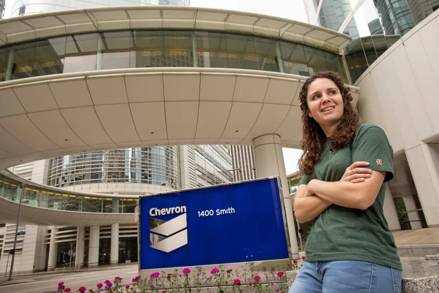 Sarah Mayo in front of Chevron headquarters