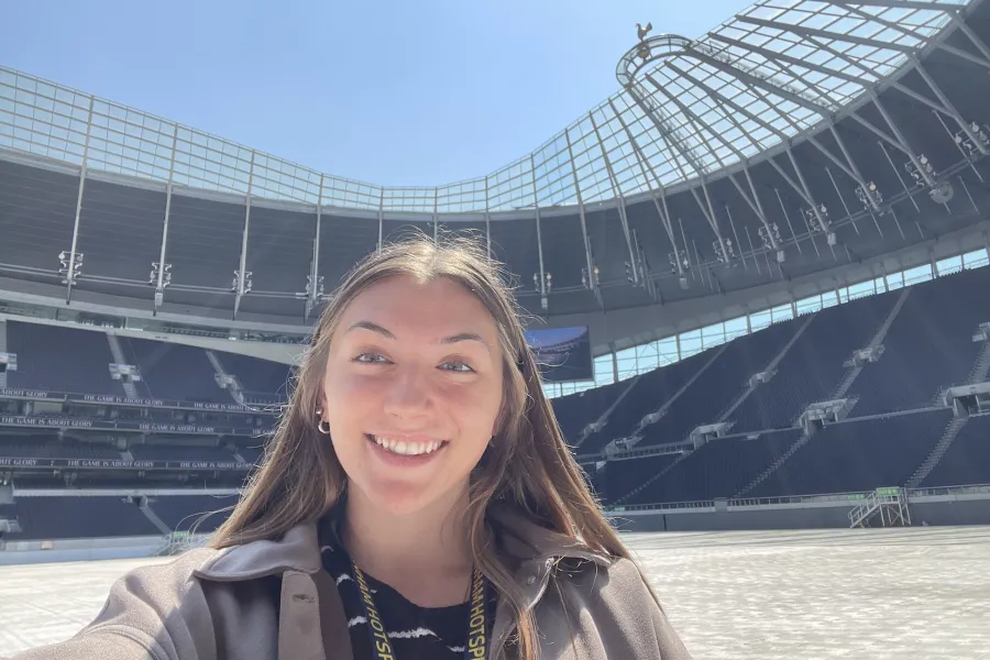Marietta College student Kaylie Ward ’24 poses for a photo at Tottenham Hotspur Stadium during her Education Abroad trip to London